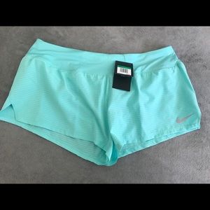 NWT NIKE dry fit turquoise crew shorts